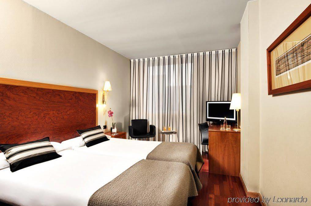 爱科赛德利西亚广场酒店 萨拉戈萨 客房 照片